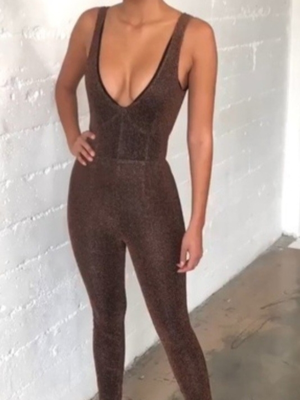 House of CB Pasqua Bronze Jumpsuit, a sleeveless, shimmering metallic knit one-p